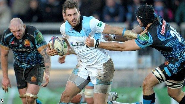 Glasgow's Sean Lamont holds off an Exeter tackle