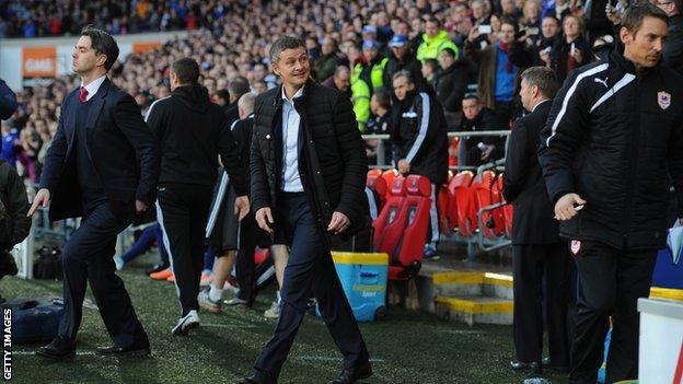 Ole Gunnar Solskjaer walks out for the first time at Cardiff City Stadium as manager