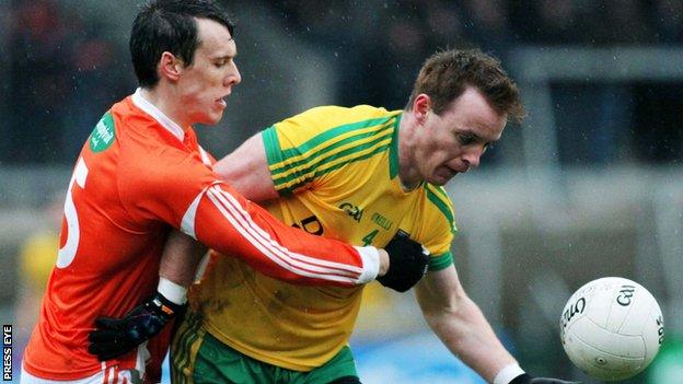 Armagh's Mark Shields with challenges Eamonn Doherty of Donegal