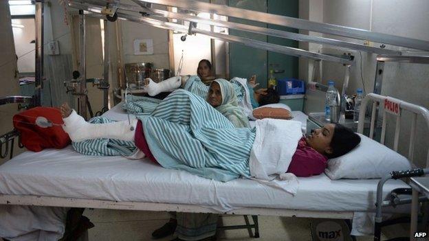 An Indian polio patient lies on a bed during treatment at St. Stephens Hospital in New Delhi. I