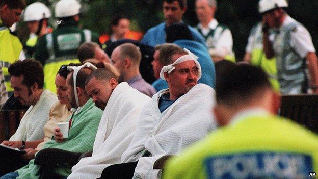 Injured victims in the aftermath of the Soho pub bombing