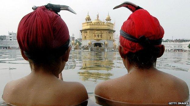 Sikh devotees by the Golden Temple of Amritsar