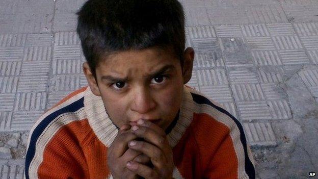 Child in the Palestinian camp of Yarmouk near Damascus