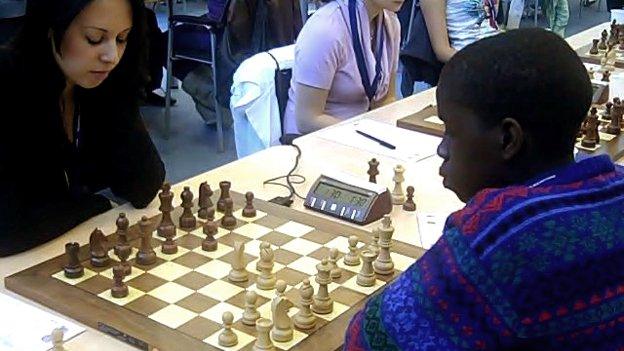 Phiona (right) in action at the 2010 chess Olympiad in Siberia