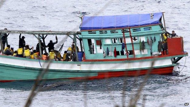 File photo: a fishing boat carrying Vietnamese asylum seekers nears the shore of Australia's Christmas Island on 14 April 2013