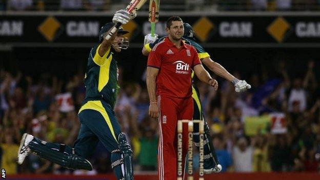 Australia celebrate their dramatic one-wicket win against England at Brisbane