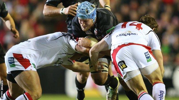 Leicester number eight Jordan Crane hammers into the Ulster defence