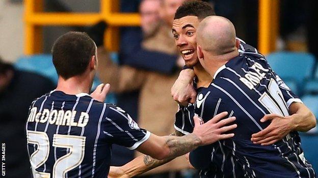 Ryan Fredericks (centre) celebrates his goal for Millwall