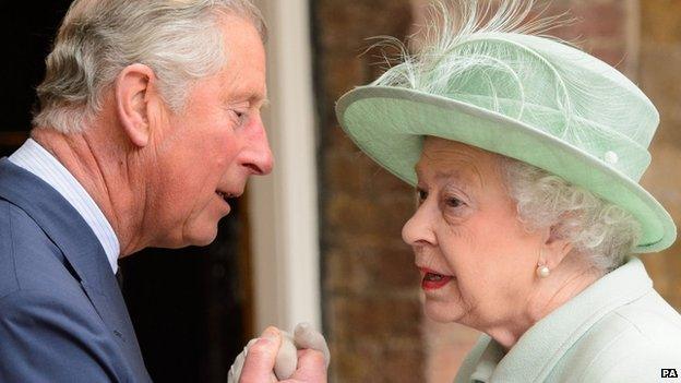 File photo dated 14/05/13 of Queen Elizabeth II being greeted by the Prince of Wales as she arrives at the Chapel Royal, at St James's Palace, central London, to attend a service for members of the Order of Merit