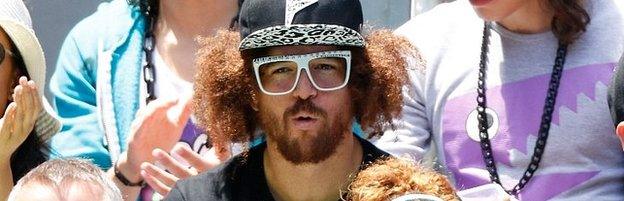 Singer Redfoo watches Victoria Azarenka