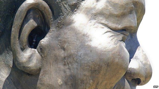 The rabbit in the ear of the Nelson Mandela statue, Pretoria, South Africa