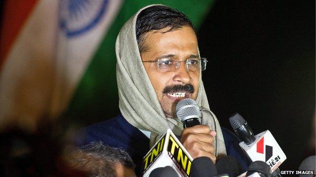 Delhi's Chief Minister Arvind Kejriwal talking to journalists at his sit-in on 21 January