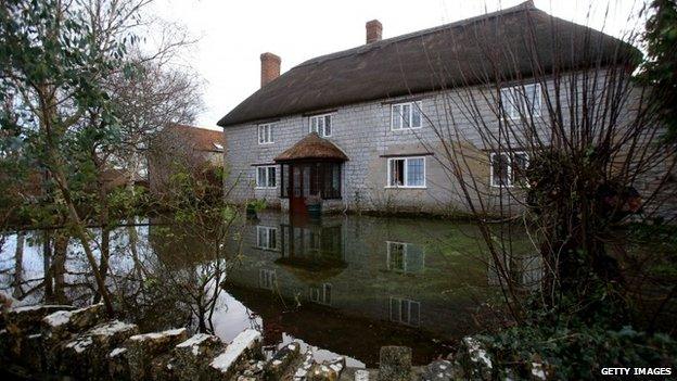 Flood water surrounds house in the village of Muchelney