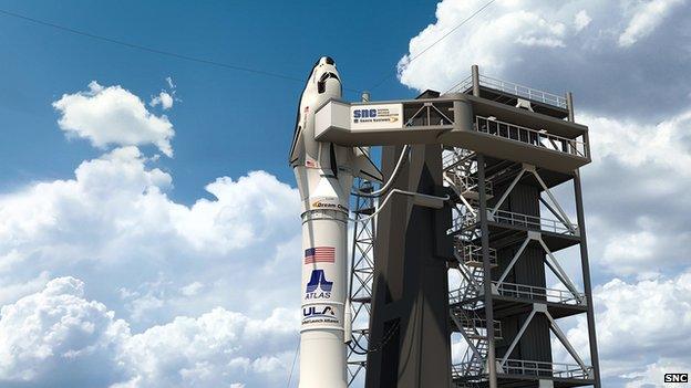 An artist's impression of the Dream Chaser atop its Atlas rocket, ready for launch