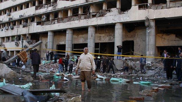 Scene of car bomb blast in Cairo on 24 January 2014