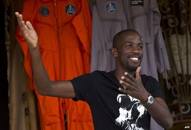 Mandla Maseko with his spacesuits