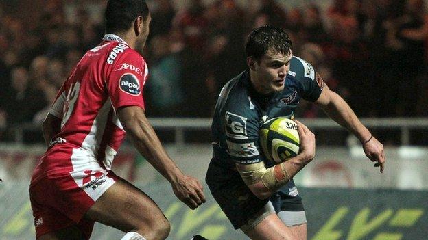 Scarlets’ Steffan Hughes runs in for his side’s first try