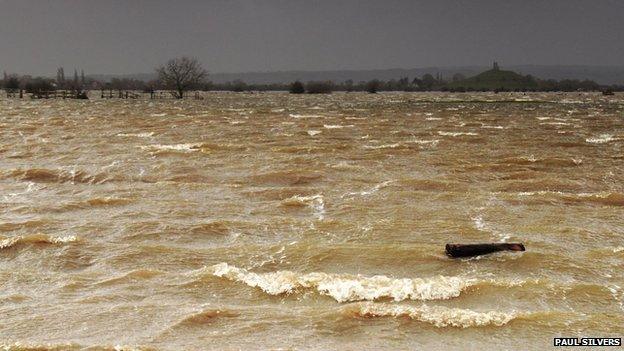 A stong wind whips up waves near Burrow Mump the only land above water in the area.