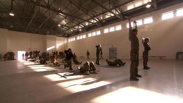 Soldiers training in the gym