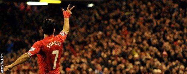 Luis Suarez celebrates scoring against Hull at Anfield