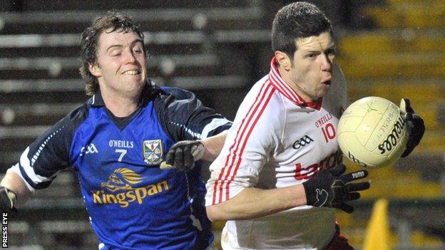 Cavan's Damien O'Reilly tracks Sean Cavanagh of Tyrone