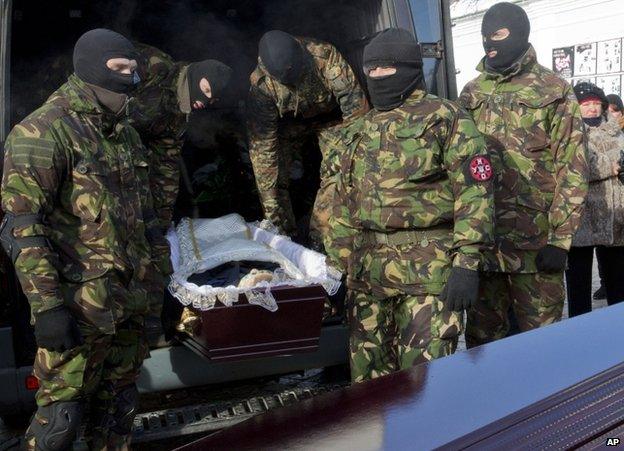 The paramilitary funeral of shooting victim Mikhail Zhyznewski in Kiev, 26 January