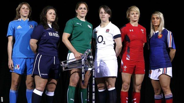 Italy's Sylvia Gaudino, Scotland's Tracey Balmer, Ireland's Fiona Coghlan, England's Katy McLean, Wales' Philippa Tuttiett and France's Marie-Alice Yahe pose with the Six Nations trophy