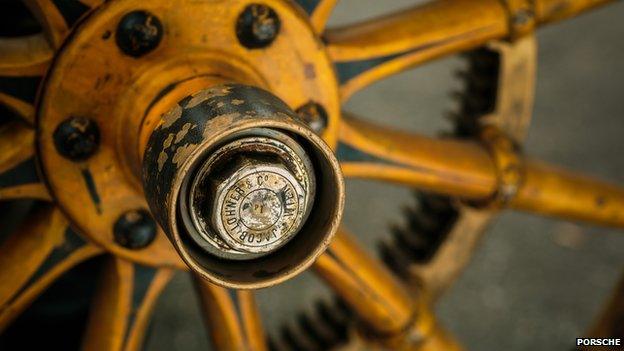 Close up of wheel on first Porsche