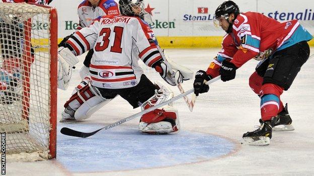 Kevin Saurette pokes in Belfast's second goal in Tuesday's first-leg win over Cardiff