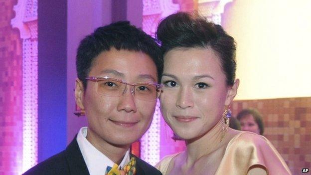 File photo: Gigi Chao, right, daughter of the Hong Kong property tycoon Cecil Chao, poses with her partner Sean Eav at an event in Hong Kong