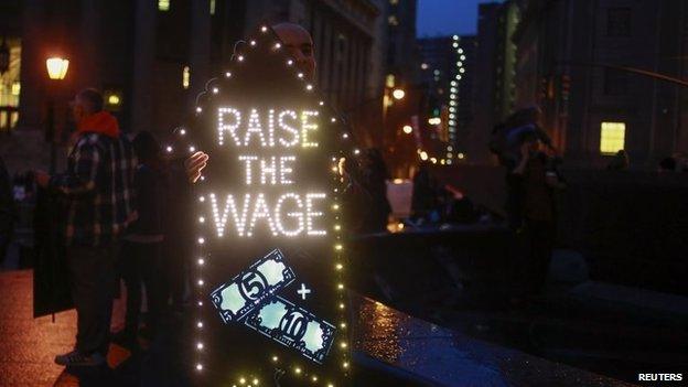 Demonstrators gather during a nationwide strike and protest at fast food restaurants to raise the minimum hourly wage to $15 in New York