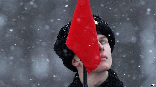 A soldier looks on during a parade marking the 70th anniversary of the battle that lifted the siege of Leningrad