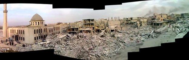 Mosaic of video frames shows the destruction of the Tadamon neighbourhood. The Mosque of Ali bin Abi Talib which is visible was left standing but severely damaged. Video taken on 5 November 2012