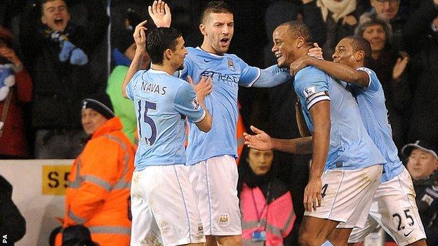 Manchester City celebrate at White Hart Lane