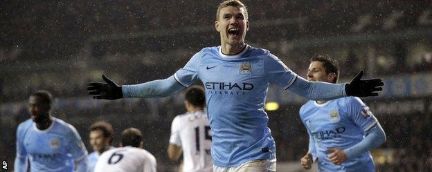 Edin Dzeko celebrates against Tottenham