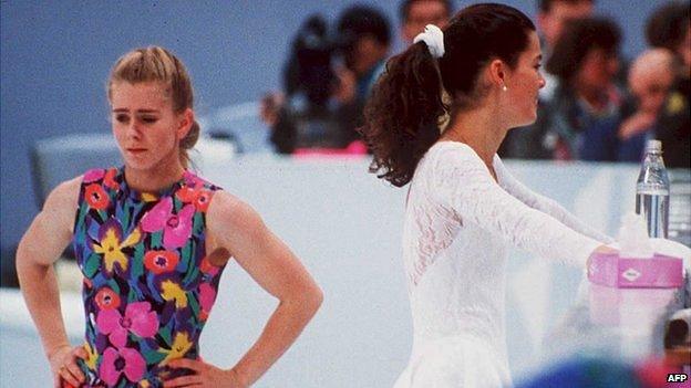 Tonya Harding (left) walks past Nancy Kerrigan (right) during a practice session in Hamar, Norway