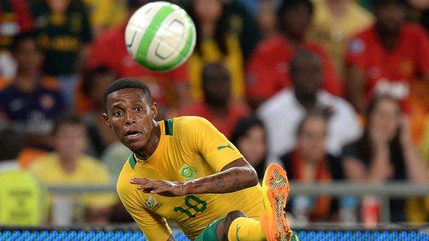 Bongani Zungu of South Africa kicks a ball during an friendly match between South Africa and Spain in South Africa in November 2013