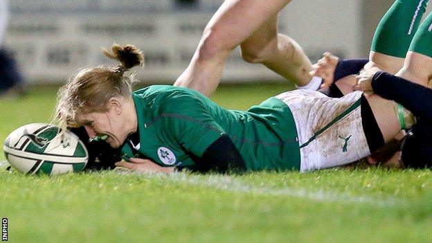 Heather O'Brien scores Ireland's third try against Scotland