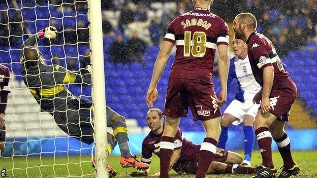 Federico Macheda (second right scores for Birmingham against Derby