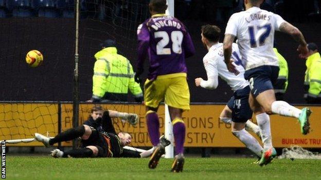 Joe Garner scores Preston's second goal from the penalty spot