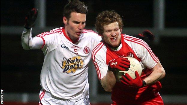 Enda Lynn tries to burst away from Ciaran McGinley at Celtic Park