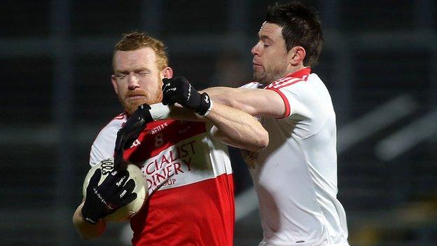 Fergal Doherty battles with Conor Clarke at Celtic