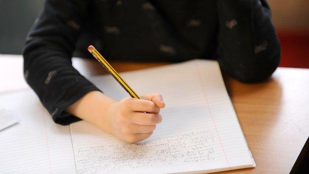 Child writing lines