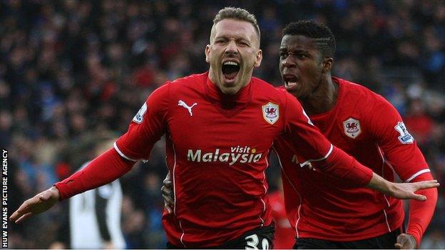 Craig Bellamy celebrates scoring an equaliser against Norwich City