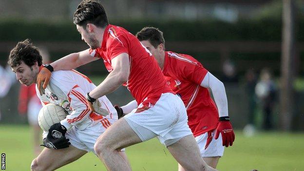 Armagh captain Jamie Clarke comes under pressure from Louth's Eoin O'Connor and Padraig Rath