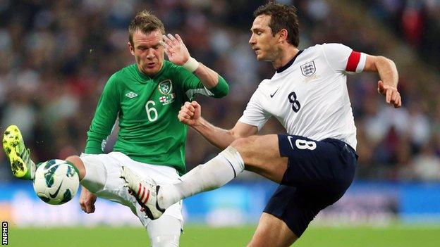 Glenn Whelan of the Republic of Ireland in action against England's Frank Lampard at Wembley in May 2013