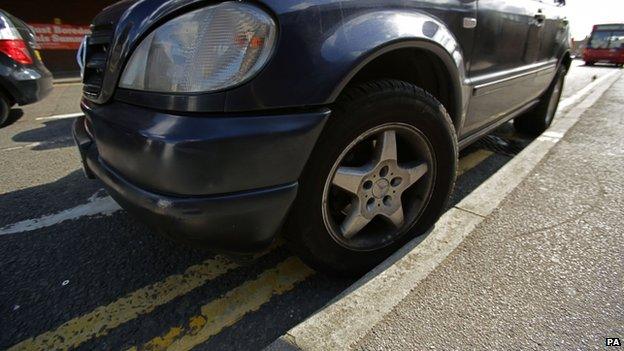 Car on double yellow lines