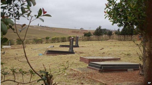 The Mandela family grave in Qunu, right, from where the remains of three family members of former South African president Nelson Mandela were removed by his grandson. A court ordered him to return the remains.