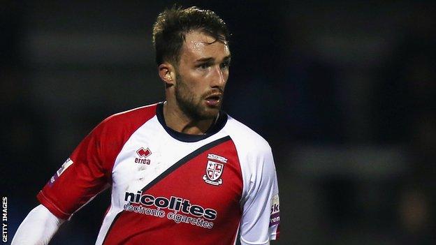 Woking midfielder Josh Payne