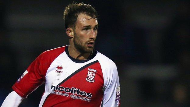 Woking midfielder Josh Payne